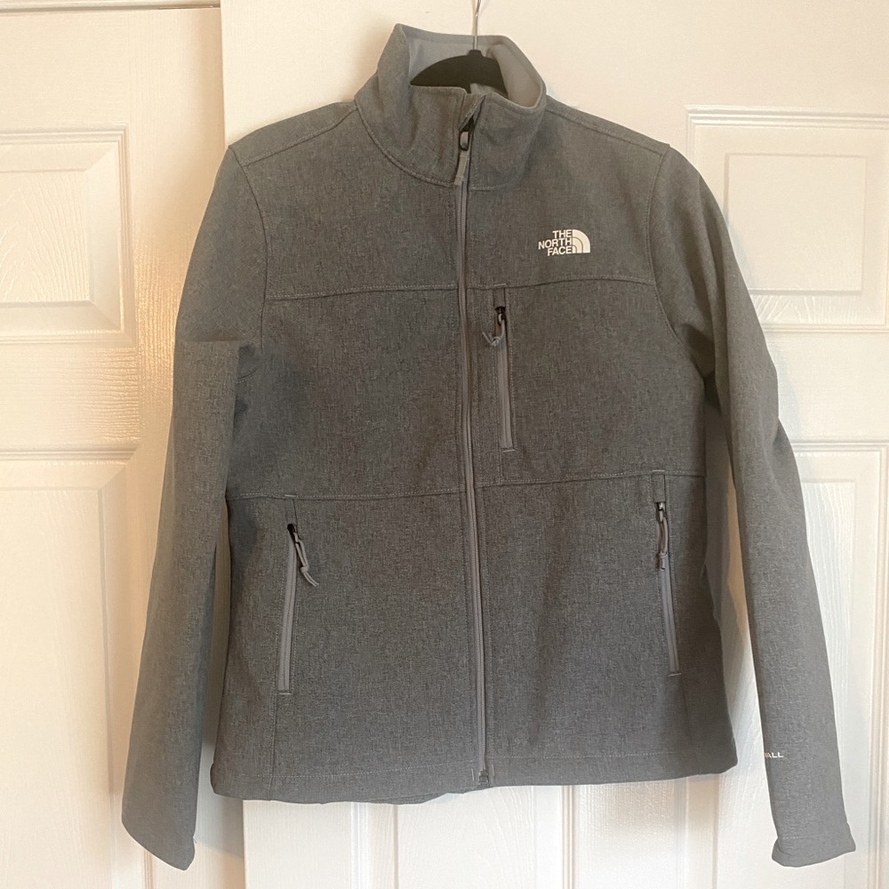Grey Northface windbreaker jacket. Women’s size M. Never worn
